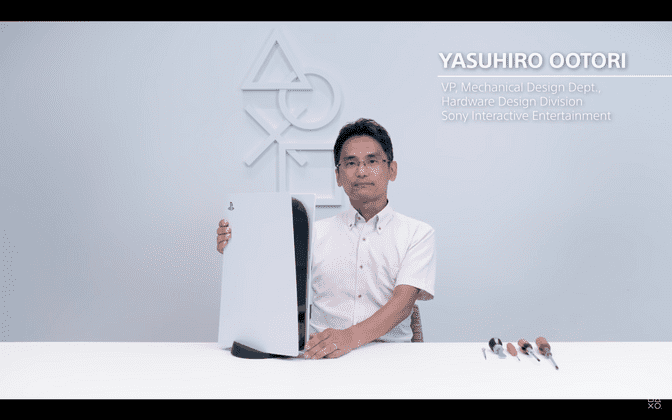 Yasuhiro Ootori with vertically oriented PlayStation 5